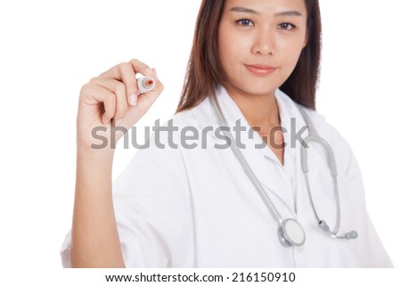 Young Asian female doctor with red marker focus at marker  isolated on white background
