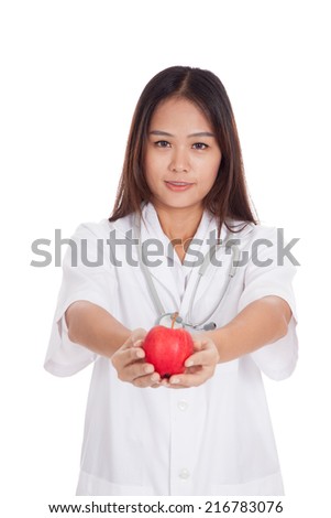 Young Asian female doctor show an apple  isolated on white background