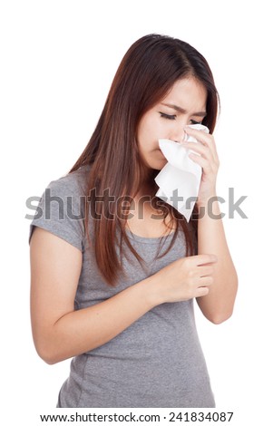 Sad young Asian woman cry using a tissue paper  isolated on white background