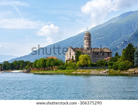 Lake Como (Italy) shore summer view with church from ship board