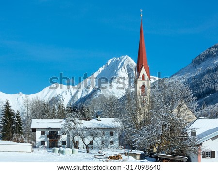 Haselgehr village and Catholic parish church St. Martin. Winter view (Austria, Tirol). 1689 a chapel was named in Martin Unterhof. 1704 took place a new building.
