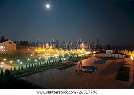 full moon night sea and recreation center lights (Jalta village, Donetsk Region, Ukraine)