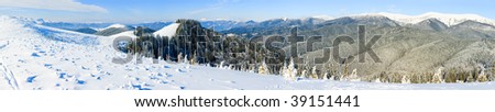 winter calm mountain landscape with rime and snow covered forest.  Twelve shots stitch image.