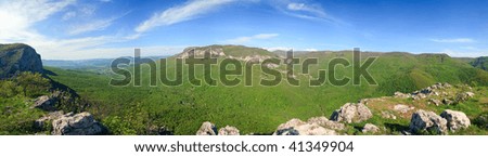 Summer Crimea Mountain panorama (Ukraine). Great Crimean Canyon far left.