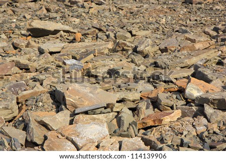 Many large and small stones on the ground. Stone desert.