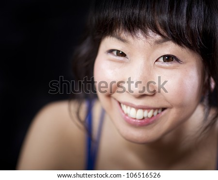 Beautiful Asian woman close up portrait in studio
