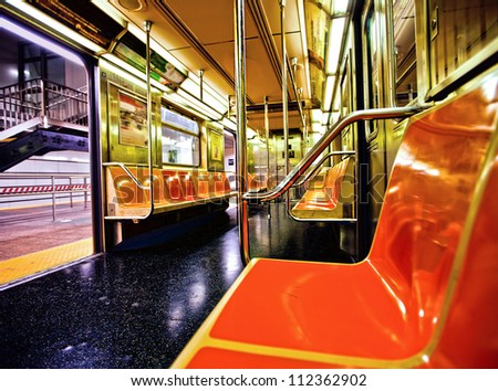 stock-photo-new-york-subway-car-interior-with-open-door-112362902.jpg