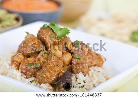 Beef curry served on a bed of rice