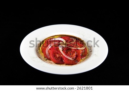 Fresh tomato and onion salad with seasoning