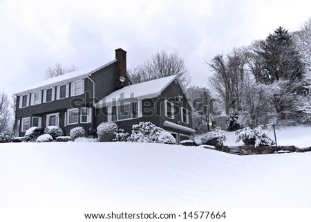 Traditional American colonial style house in winter