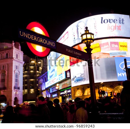 LONDON, ENGLAND FEB 13: Famous Piccadilly Circus neon signage that has become a major attraction of London on Feb 13, 2012 in London, United Kingdom.