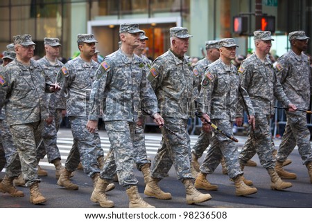 NEW YORK, NY, USA MAR 17: Marching US miltary soldiers from the 69th Infantry at the St. Patrick's Day Parade on March 17, 2012 in New York City, United States.