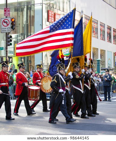 NEW YORK, NY, USA - MAR 17: Marching US military soldiers at the St. Patrick\'s Day Parade on March 17, 2012 in New York City, United States.