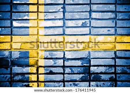 Grunge flag of European country Sweden on brick wall