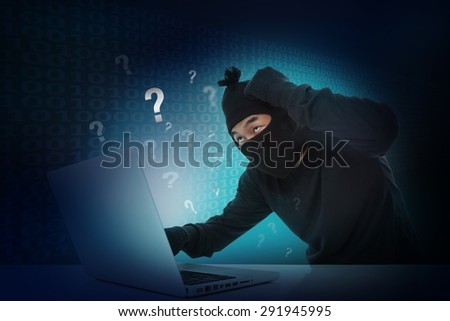 Hacker stealing data on laptop computer with question mark sign icon.