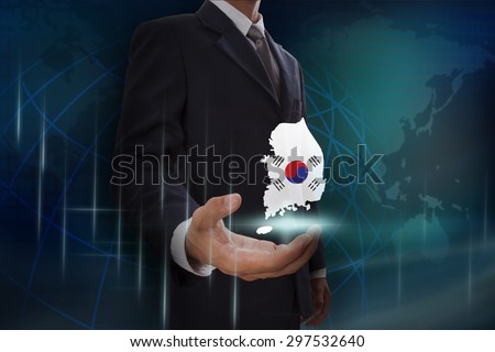 Businessman showing map of Australia on globe background