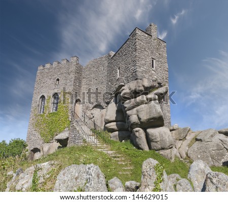 Carn Brea Castle in Cornwall, England is a 14th-century grade II listed granite stone building which was extensively remodelled in the 18th century as a hunting lodge in the style of a castle.