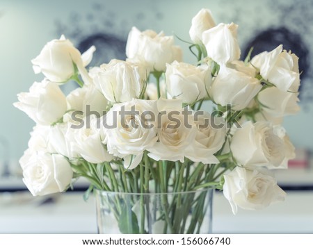 White roses in a glass vase