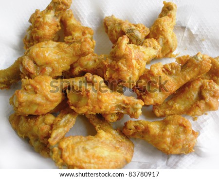 Fried chicken thailand on white paper isolated