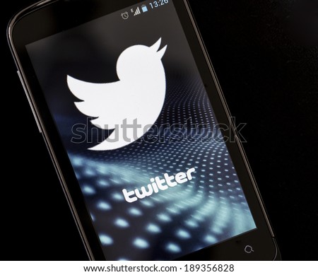 BELGRADE APRIL 26 2014 Logo of popular social media website Twitter on smart phone screen BELGRADE APRIL 26 2014 Logo of popular social media website Twitter on smart phone screen