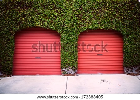 Garage building made of concrete with roller shutter doors