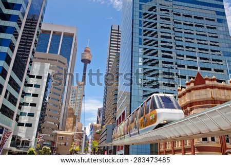 SYDNEY, AUSTRALIA - Dec 27: A monorail runs above the public street in Darling Harbour area of Sydney on December 27,2011 in Sydney. The monorail is a unique public transport system in Sydneys CBD.