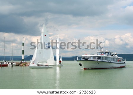 the lake balaton is the largest lake in middle-eastern europe. Sailing boat and funny ship at Lake Balaton