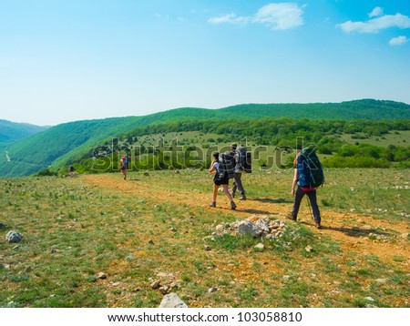 Young people hikes in Crimea mountains