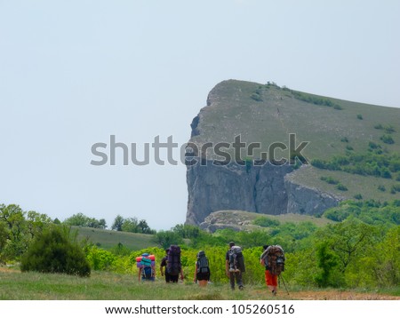 Hikers group walking in Crimea mountains