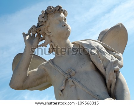 Classic Zephyrus statue at The Upper Garden, Peterhof near St.Petersburg, Russia