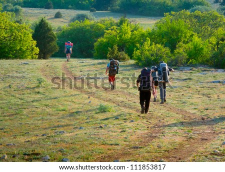Young people hikes in Crimea mountains