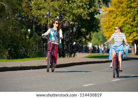 MOSCOW-SEPT.12: Unidentified people ride bicycles near Gorky Park on Sept. 12, 2012 in Moscow.City government has built a new bicycle path on the embankment of the Moscow River for citizens recreation