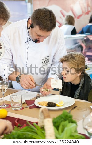 MOSCOW - APRIL 6: Chef Andrew Kuspits shows how to properly prepare and eat seafood at culinary master class 