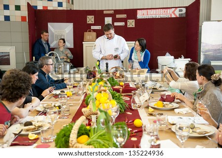 MOSCOW - APRIL 6: Chef Andrew Kuspits shows how to properly prepare and eat seafood at culinary master class \