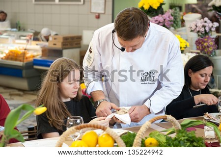 MOSCOW - APRIL 13: Chef Andrew Kuspits shows how to properly prepare and eat seafood at culinary master class \