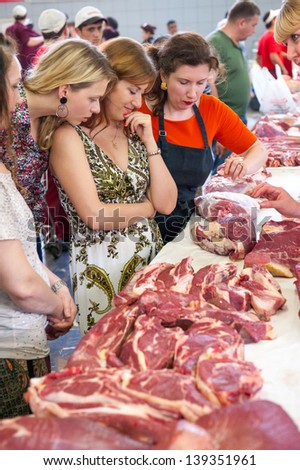 MOSCOW - MAY 18: Chef Anna Semenova shows how to properly choose and cook beef at culinary master class 