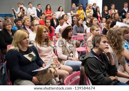 MOSCOW - MAY 22: Unidentified people listen to speech at graduation 