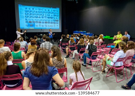MOSCOW MAY 22 Unidentified people listen to speech at graduation Colours of Life in MOD gallery on May 22 2013 in Moscow MOSCOW MAY 22 Unidentified people listen to speech at graduation Colours of Life in MOD gallery on May 22 2013 in Moscow
