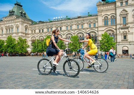 MOSCOW - MAY 19: Cyclists ride during the Day of the Uniform Bike Action on May 19, 2013 in Moscow. During this event many cyclists ride bicycles in an unusual wear and took part in the flash mobs