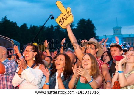 MOSCOW - JUNE 16: People cheering at open-air concert on X International Jazz Festival 