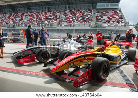 MOSCOW - JUNE 23: Formula cars show at pit lane at World Series by Renault in Moscow Raceway on June 23, 2013 in Moscow