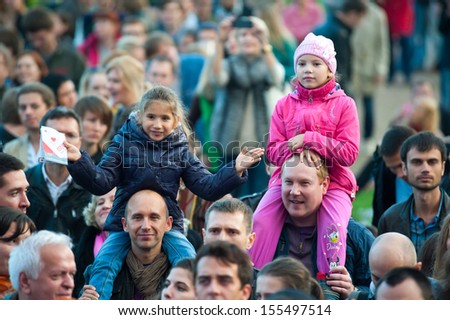 MOSCOW - JUNE 15: People attend open-air concert at Usadba Jazz Festival in Kuskovo Mansion on September 7, 2013 in Moscow. This festival was held on the Day of Moscow and was free to visit