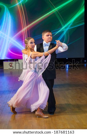 MOSCOW - MARCH 16: Unidentified children age 10-14 compete in waltz dance on the Artistic Dance European Championship, organized by World Dance Artistic Federation on March 16, 2014, in Moscow.