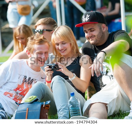 MOSCOW - MAY 24: People attend open-air concert on Bosco Fresh Festival in Muzeon Park on May 24, 2014 in Moscow