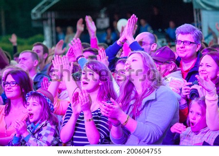 MOSCOW - JUNE 14: People cheering at open-air concert on XI International Jazz Festival 