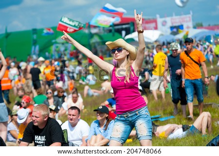 BIG ZAVIDOVO, RUSSIA - JULY 5: People attend open-air rock festival 