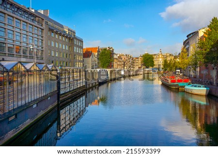 Canal in Amsterdam, which is the flower market