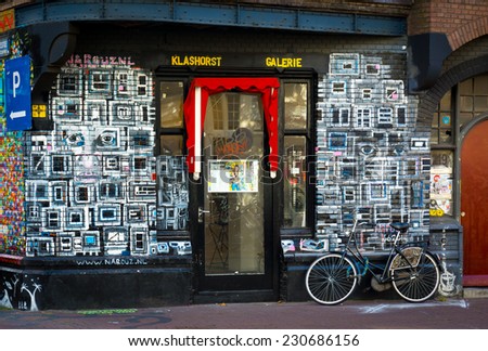 AMSTERDAM - AUGUST 26: Facade painted by graffiti on August 26, 2014 in Amsterdam.