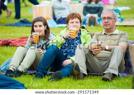 MOSCOW - JUNE 20, 2015: Family drink beer on XII International Jazz Festival \