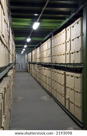 Cardboard boxes on the shelves in the warehouse